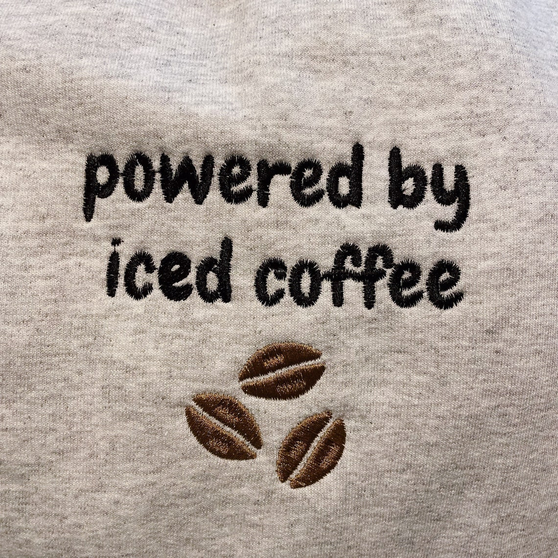 Powered By Iced Coffee Embroidered Crewneck Sweatshirt