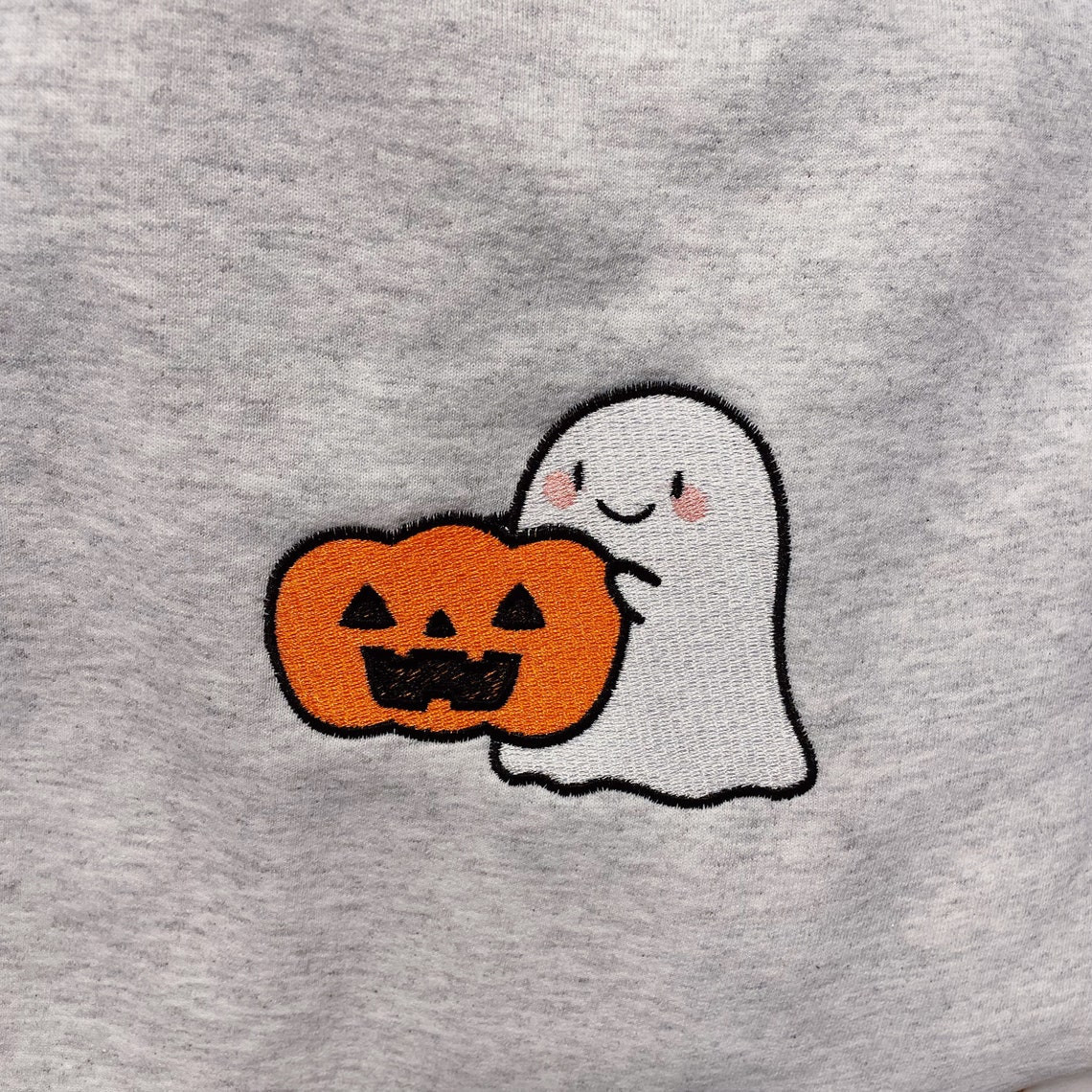 Ghost Holding Pumpkin Embroidered Crewneck Sweatshirt