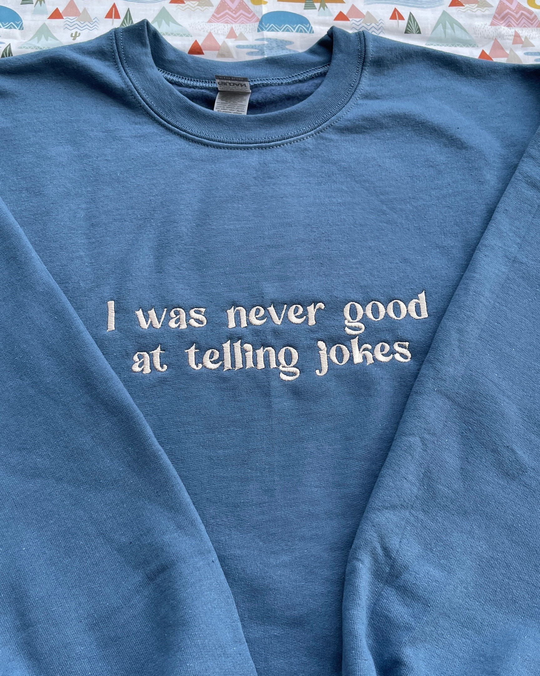 Never Good At Telling Jokes Taylor Embroidered Crewneck Sweatshirt