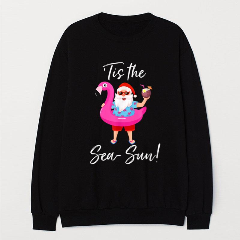 Santa Claus Flamingo Float Tis The Sea Sun Christmas In July T-Shirt Unisex