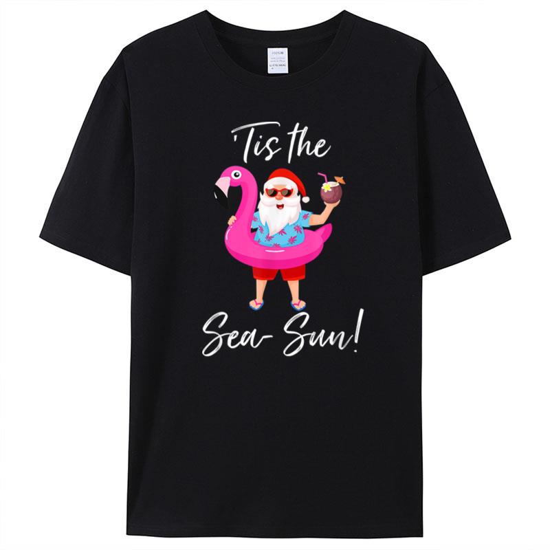 Santa Claus Flamingo Float Tis The Sea Sun Christmas In July T-Shirt Unisex